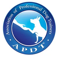 APDT logo with a dog touching a human hand inside a blue circle labeled "Association of Professional Dog Trainers.